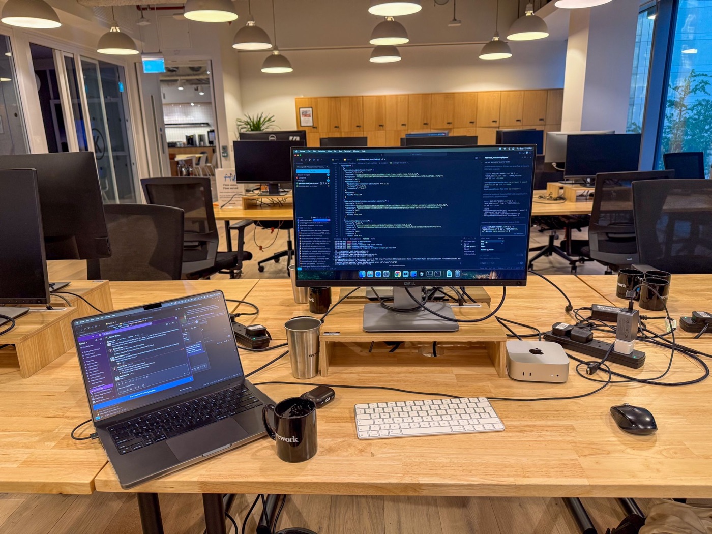 Mac mini set up at the WeWork desk as an in-house server